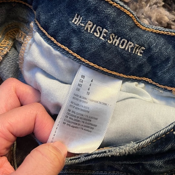 Hi-Rise Distressed Jean Shorts - Picture 4 of 9